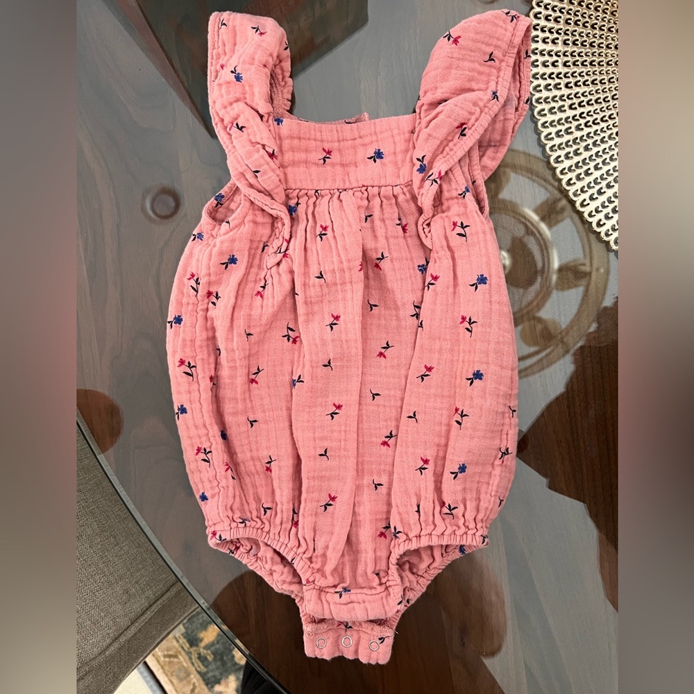 Snap bottom romper.